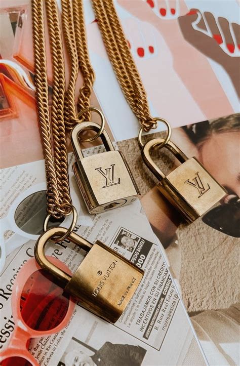 louis vuitton lockit necklace fake|faux louis vuitton earrings.